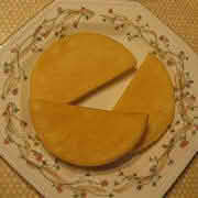 A plate displaying three pieces of Bammies, cut in half-circle shapes